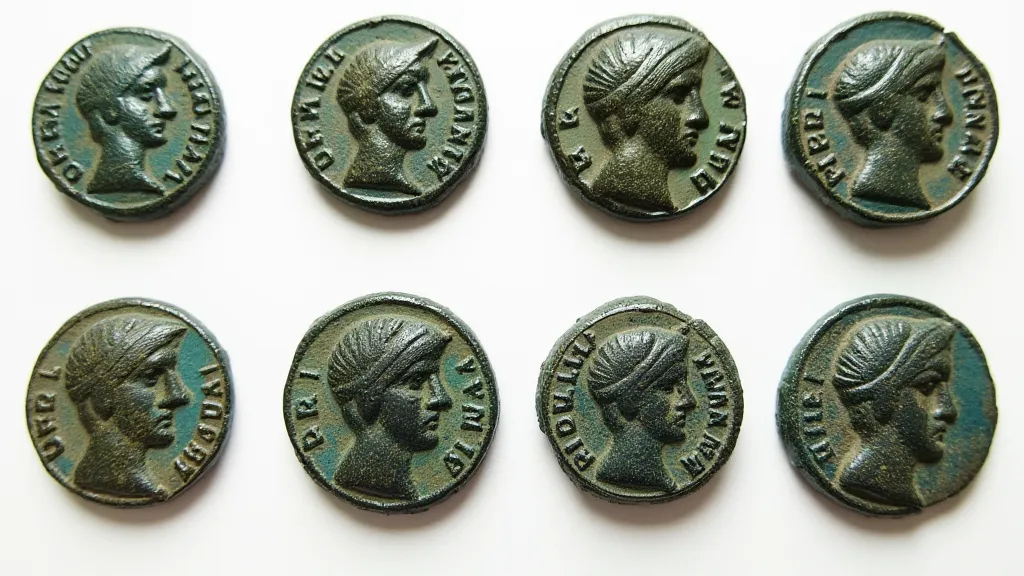 Collection of Roman coin replicas with varying patina